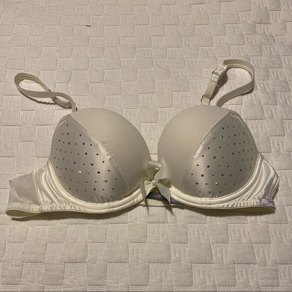 White bra with rhinestone and bow details